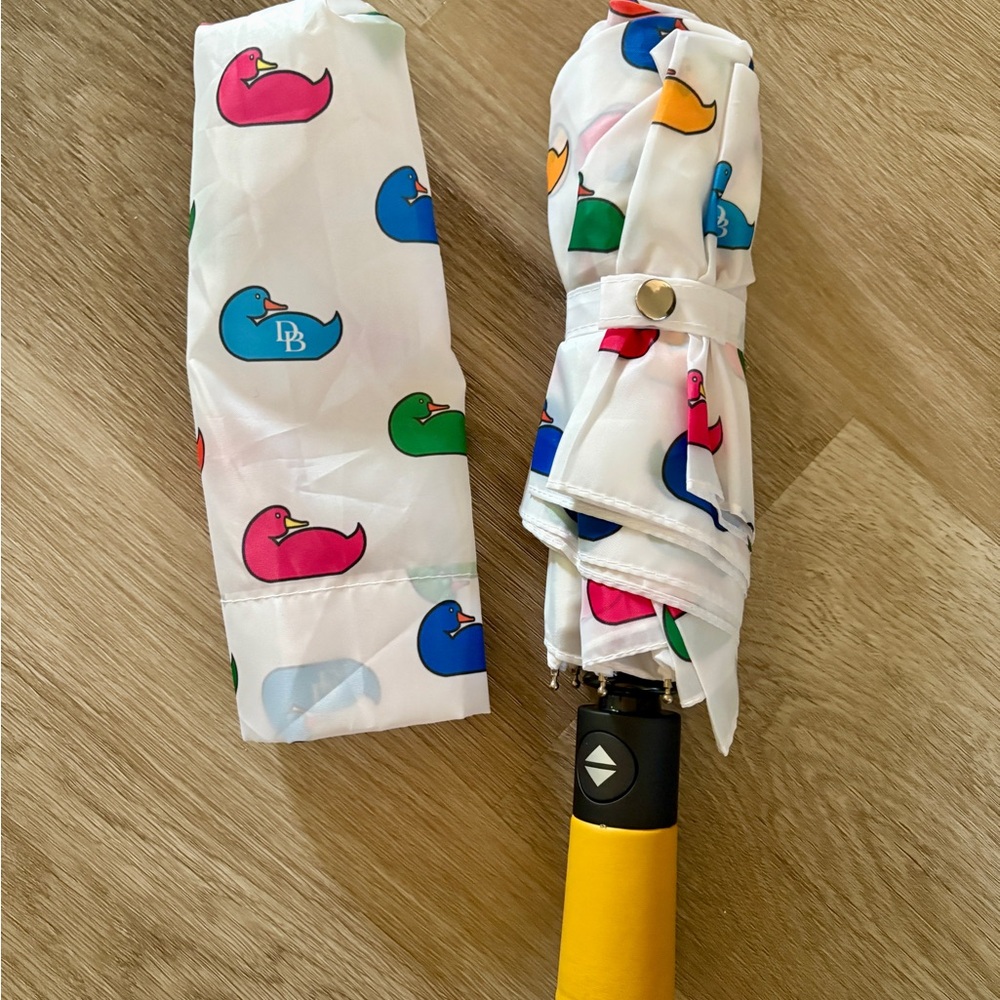 Dooney & Bourke Pink and White Umbrella Accessories